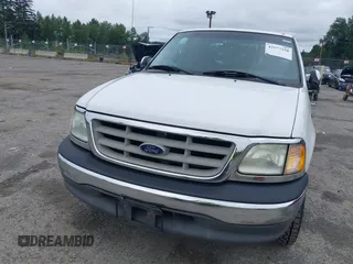 2002 Ford F-150 XL with VIN 1FTRX17L32NA19687, listed as a IAAI auction lot 42577258 with 216,685 mi miles and . Bid and sale history available at DreamBid. Image 6.