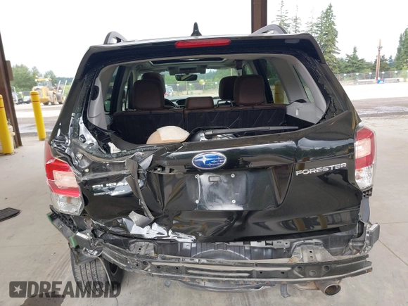 2018 Subaru Forester Touring with VIN JF2SJAWC2JH598982, listed as a IAAI auction lot 42455652 with 57,254 mi miles and . Bid and sale history available at DreamBid. Image 6.