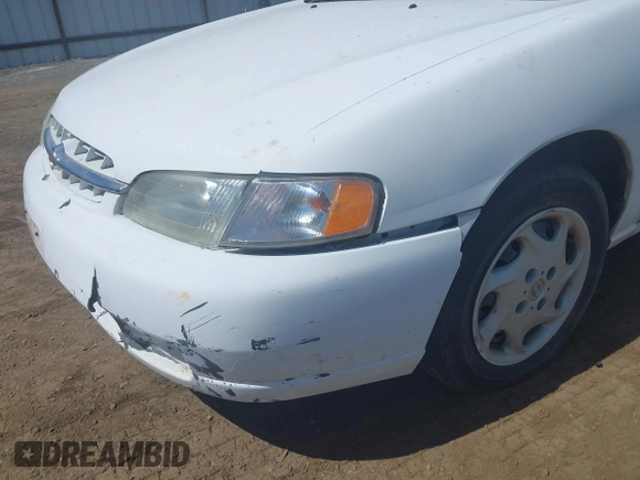 1999 Nissan Altima XE with VIN 1N4DL01D9XC104530, listed as a IAAI auction lot 42141246 with 168,803 mi miles. Bid and sale history available at carsss.com. Image 16.