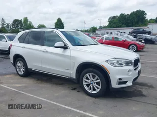 2014 BMW X5 sDrive35i z VIN 5UXKR2C54E0H34800, wystawiony jako IAAI lot #42110978 z przebiegiem 106 891 mil mil oraz . Historia ofert i sprzedaży dostępna na DreamBid. Obrazek 1.