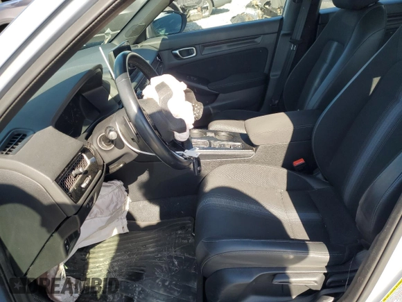 2023 Honda Civic Sport with VIN 19XFL2H88PE000014, listed as a Copart auction lot 43042575 with 28,836 mi miles and Salvage Title. Bid and sale history available at DreamBid. Image 7.