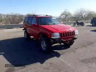 1996 Jeep Grand Cherokee Limited with VIN 1J4GZ78Y0TC376265, listed as a Copart auction lot 52124345 with 205,676 mi miles and Salvage Title. Bid and sale history available at carsss.com. Image 11.