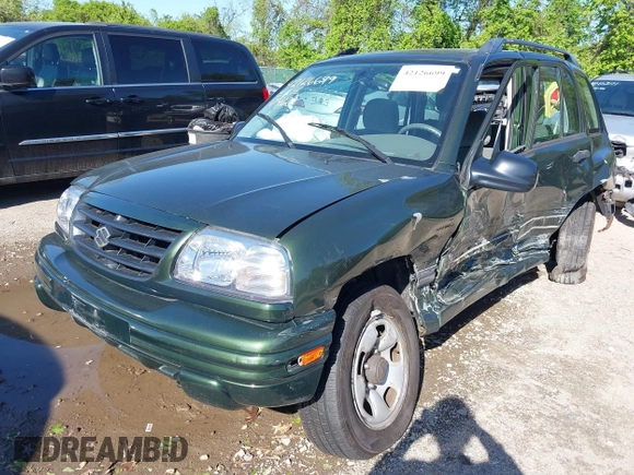 2001 Suzuki Vitara JX z VIN 2S3TD52V416109787, wystawiony jako IAAI lot #42126699 z przebiegiem Nie podano mil oraz . Historia ofert i sprzedaży dostępna na DreamBid. Obrazek 13.