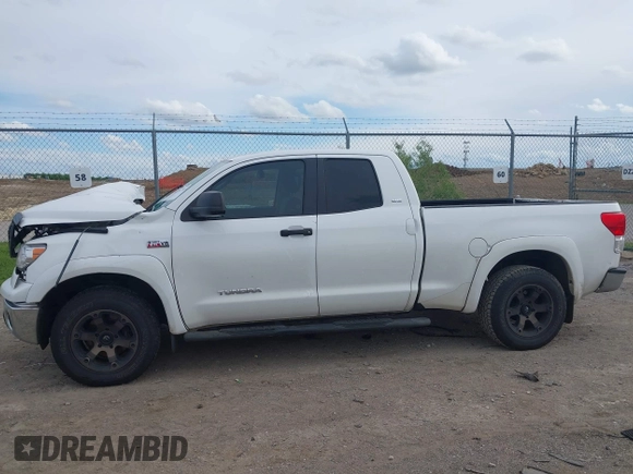 2012 Toyota Tundra with VIN 5TFUW5F16CX225421, listed as a IAAI auction lot 42210783 with 207,025 mi miles and . Bid and sale history available at DreamBid. Image 14.