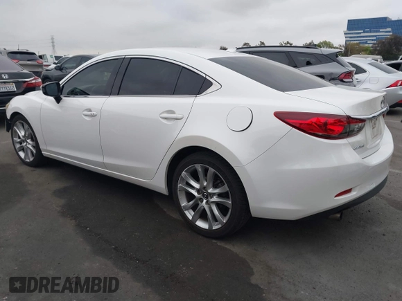 2016 Mazda Mazda6 i Touring with VIN JM1GJ1V52G1468807, listed as a IAAI auction lot 41888686 with 121,764 mi miles. Bid and sale history available at carsss.com. Image 3.