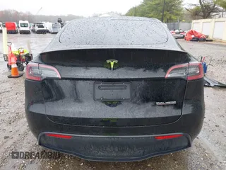 2023 Tesla Model Y Performance z VIN 7SAYGDEF0PF715703, wystawiony jako IAAI lot #41869780 z przebiegiem 32 220 mil mil oraz . Historia ofert i sprzedaży dostępna na DreamBid. Obrazek 15.