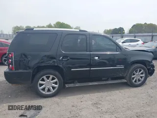 2014 GMC Yukon Denali z VIN 1GKS1EEFXER113493, wystawiony jako IAAI lot #41742662 z przebiegiem 150 382 mil mil oraz . Historia ofert i sprzedaży dostępna na DreamBid. Obrazek 13.