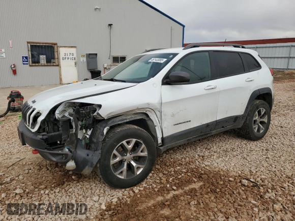 2014 Jeep Cherokee Trailhawk with VIN 1C4PJMBS7EW183855, listed as a Copart auction lot 46143085 with 146,901 mi miles and Salvage Title. Bid and sale history available at DreamBid. Image 1.