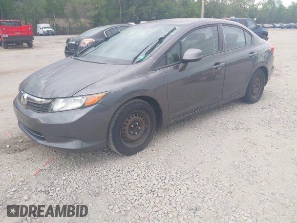 2012 Honda Civic LX z VIN 2HGFB2F58CH590369, wystawiony jako IAAI lot #42402397 z przebiegiem 202 116 mil mil oraz . Historia ofert i sprzedaży dostępna na DreamBid. Obrazek 2.
