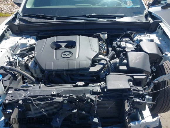 2024 Mazda CX-30 S Premium with VIN 3MVDMBDM8RM633580, listed as a IAAI auction lot 42152915 with 18,679 mi miles and . Bid and sale history available at DreamBid. Image 10.
