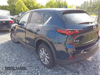 2023 Mazda CX-5 S Preferred with VIN JM3KFBCM1P0260992, listed as a IAAI auction lot 42192977 with 22,445 mi miles and . Bid and sale history available at carsss.com. Image 3.
