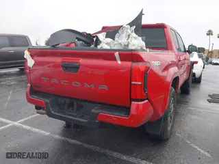 2024 Toyota Tacoma 4WD SR5 with VIN 3TYLB5JN3RT021289, listed as a IAAI auction lot 41538997 with 8,186 mi miles. Bid and sale history available at carsss.com. Image 4.