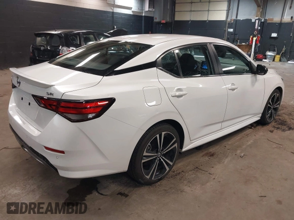 2021 Nissan Sentra SR z VIN 3N1AB8DVXMY320878, wystawiony jako IAAI lot #41911623 z przebiegiem 13 134 mil mil oraz . Historia ofert i sprzedaży dostępna na DreamBid. Obrazek 4.