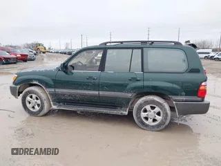 2000 Toyota Land Cruiser with VIN JT3HT05J8Y0084239, listed as a IAAI auction lot 41440548 with 240,000 mi miles. Bid and sale history available at carsss.com. Image 14.