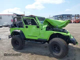 2004 Jeep Wrangler Sahara z VIN 1J4FA59S44P704878, wystawiony jako IAAI lot #42226255 z przebiegiem 88 886 mil mil oraz . Historia ofert i sprzedaży dostępna na DreamBid. Obrazek 14.