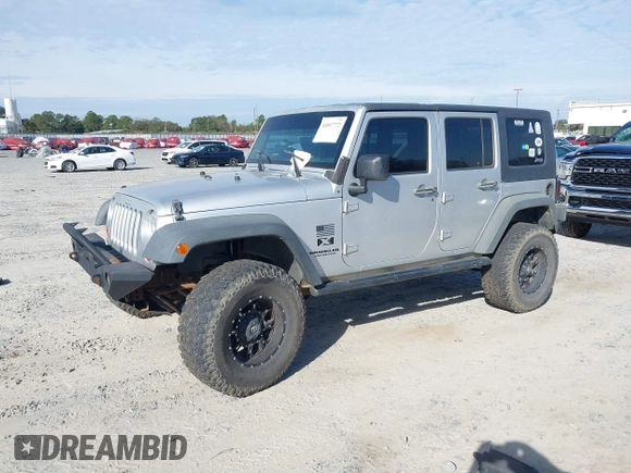 2007 Jeep Wrangler Unlimited X with VIN 1J4GB39147L199367, listed as a IAAI auction lot 40897772 with 229,309 mi miles and . Bid and sale history available at DreamBid. Image 2.