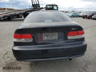 2000 Honda Civic EX with VIN 1HGEJ8243YL128682, listed as a Copart auction lot 52088565 with 0 mi miles and Salvage Title. Bid and sale history available at carsss.com. Image 6.