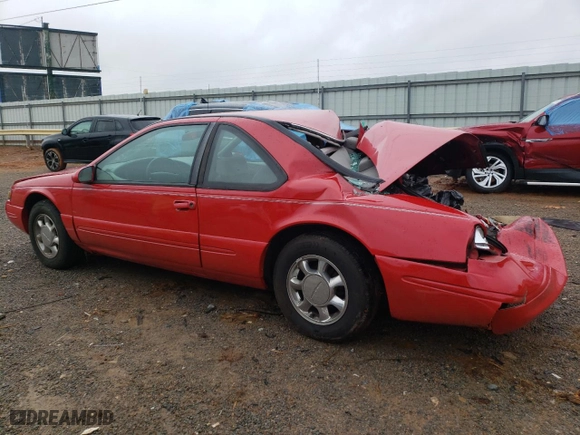 1996 Ford Thunderbird LX with VIN 1FALP62W8TH174603, listed as a Copart auction lot 72928574 with 153,614 mi miles and Salvage Title. Bid and sale history available at carsss.com. Image 2.