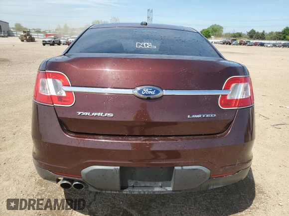 2012 Ford Taurus Limited z VIN 1FAHP2FW4CG112923, wystawiony jako Copart lot #56169085 z przebiegiem 142 687 mil mil oraz Szkoda całkowita • Salvage title. Historia ofert i sprzedaży dostępna na DreamBid. Obrazek 6.