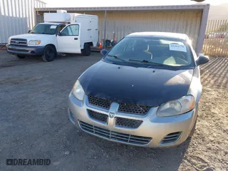 2004 Dodge Stratus SE with VIN 1B3EL36X24N267301, listed as a IAAI auction lot 41402238 with 143,579 mi miles. Bid and sale history available at carsss.com. Image 6.