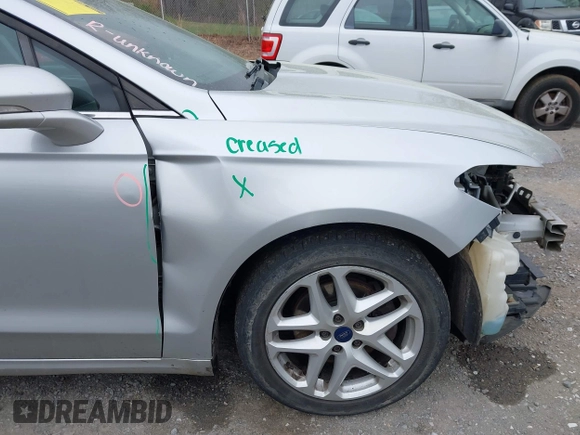 2016 Ford Fusion SE with VIN 3FA6P0H7XGR367222, listed as a IAAI auction lot 41951504 with 199,572 mi miles and . Bid and sale history available at DreamBid. Image 12.