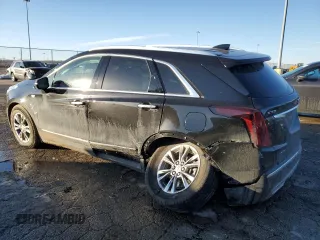 2021 Cadillac XT5 AWD Premium Luxury with VIN 1GYKNDRS6MZ111640, listed as a Copart auction lot 46567035 with 57,484 mi miles and Salvage Title. Bid and sale history available at DreamBid. Image 2.