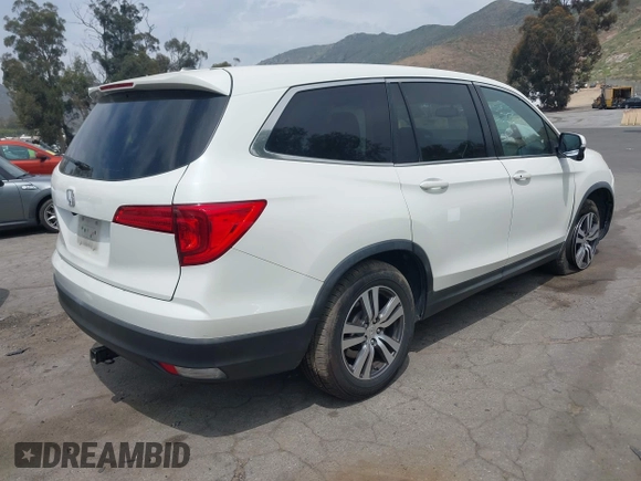 2016 Honda Pilot EX-L with VIN 5FNYF5H55GB015166, listed as a IAAI auction lot 42003009 with 142,488 mi miles and . Bid and sale history available at DreamBid. Image 4.