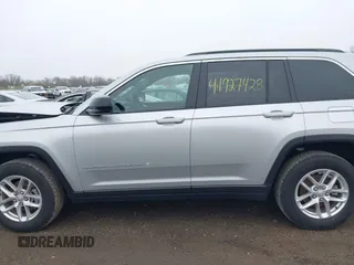 2024 Jeep Grand Cherokee Laredo X with VIN 1C4RJHAGXRC165256, listed as a IAAI auction lot 41927428 with 21,106 mi miles. Bid and sale history available at carsss.com. Image 14.