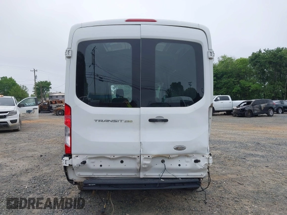 2015 Ford Transit Cargo with VIN 1FTNR2CM4FKA26975, listed as a IAAI auction lot 39407096 with 150,786 mi miles and . Bid and sale history available at carsss.com. Image 17.