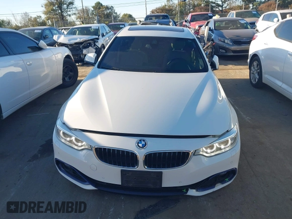 2016 BMW 4 Series 428i xDrive with VIN WBA4C9C54GG139275, listed as a IAAI auction lot 40828786 with 128,124 mi miles and . Bid and sale history available at carsss.com. Image 12.
