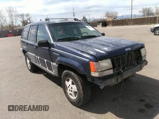 1994 Jeep Grand Cherokee Laredo with VIN 1J4GZ58Y3RC202638, listed as a IAAI auction lot 41885484 with 164,481 mi miles. Bid and sale history available at carsss.com. Image 1.