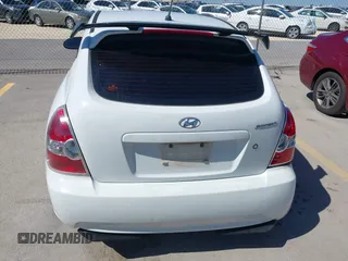2007 Hyundai Accent GS with VIN KMHCM36C47U050161, listed as a IAAI auction lot 41762927 with 111,684 mi miles. Bid and sale history available at carsss.com. Image 16.