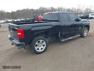 2016 GMC Sierra 1500 with VIN 1GTV2LEH9GZ421642, listed as a IAAI auction lot 40870826 with 105,326 mi miles. Bid and sale history available at carsss.com. Image 4.
