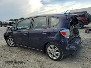 2009 Honda Fit Sport z VIN JHMGE88409S052668, wystawiony jako Copart lot #56142275 z przebiegiem 118 445 mil mil oraz Szkoda całkowita • Salvage title. Historia ofert i sprzedaży dostępna na DreamBid. Obrazek 2.
