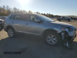 2014 Mazda CX-9 Sport with VIN JM3TB3BV7E0430656, listed as a Copart auction lot 77446184 with 119,021 mi miles and Salvage Title. Bid and sale history available at carsss.com. Image 4.