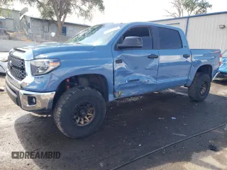 2019 Toyota Tundra SR5 z VIN 5TFDY5F1XKX799285, wystawiony jako Copart lot #56904835 z przebiegiem 77 536 mil mil oraz Szkoda całkowita • Salvage title. Historia ofert i sprzedaży dostępna na DreamBid. Obrazek 1.
