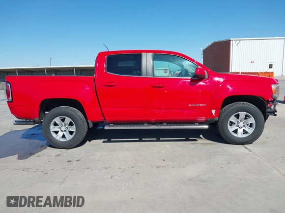 2016 GMC Canyon 2WD SLE z VIN 1GTG5CE34G1104127, wystawiony jako IAAI lot #41846079 z przebiegiem 106 123 mil mil oraz . Historia ofert i sprzedaży dostępna na DreamBid. Obrazek 14.