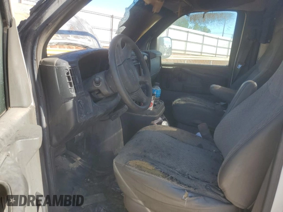 2007 GMC Savana Commercial SRW C6Y z VIN 1GDHG31U571241621, wystawiony jako Copart lot #71527434 z przebiegiem Nie podano mil oraz Szkoda całkowita • Salvage title. Historia ofert i sprzedaży dostępna na DreamBid. Obrazek 7.