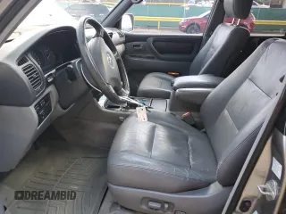 2002 Toyota Land Cruiser z VIN JTEHT05J522027452, wystawiony jako Copart lot #51141595 z przebiegiem 278 465 mil mil oraz Szkoda całkowita • Salvage title. Historia ofert i sprzedaży dostępna na DreamBid. Obrazek 13.