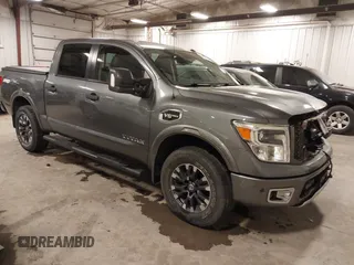 2017 Nissan Titan SL z VIN 1N6AA1E50HN504037, wystawiony jako IAAI lot #41282873 z przebiegiem 136 168 mil mil oraz . Historia ofert i sprzedaży dostępna na DreamBid. Obrazek 1.