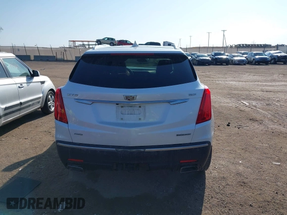 2017 Cadillac XT5 Premium Luxury AWD z VIN 1GYKNERS3HZ284561, wystawiony jako IAAI lot #41887147 z przebiegiem 119 189 mil mil oraz . Historia ofert i sprzedaży dostępna na DreamBid. Obrazek 17.