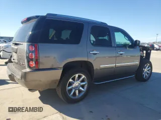 2014 GMC Yukon Denali z VIN 1GKS1EEF6ER229144, wystawiony jako Copart lot #85654154 z przebiegiem Nie podano mil oraz Szkoda całkowita • Salvage title. Historia ofert i sprzedaży dostępna na DreamBid. Obrazek 3.