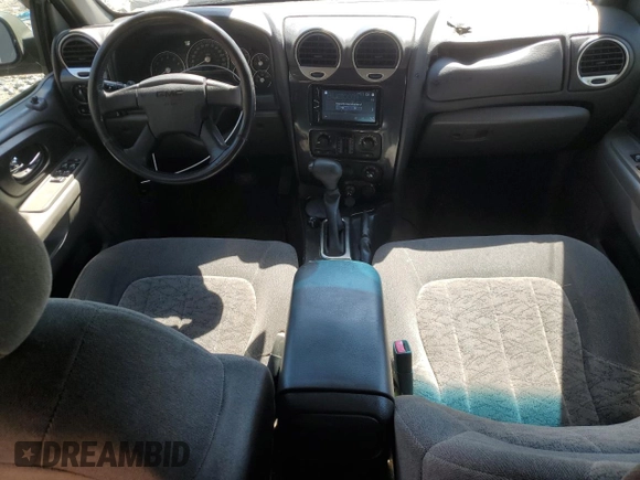 2004 GMC Envoy SLT with VIN 1GKET16S046155005, listed as a Copart auction lot 53554505 with 184,039 mi miles and Salvage Title. Bid and sale history available at DreamBid. Image 8.