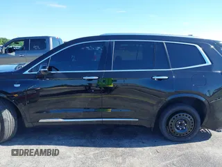 2020 Cadillac XT6 FWD Premium Luxury with VIN 1GYKPCRS7LZ211197, listed as a IAAI auction lot 42231424 with 57,351 mi miles and . Bid and sale history available at DreamBid. Image 14.
