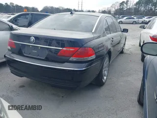 2006 BMW 7 Series 750Li with VIN WBAHN83576DT26418, listed as a IAAI auction lot 41555297 with 124,801 mi miles. Bid and sale history available at carsss.com. Image 4.
