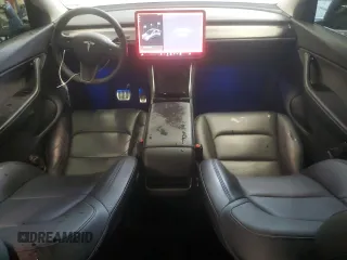 2021 Tesla Model Y Long Range with VIN 5YJYGDEE0MF076660, listed as a Copart auction lot 55957365 with 80,432 mi miles and Salvage Title. Bid and sale history available at DreamBid. Image 8.