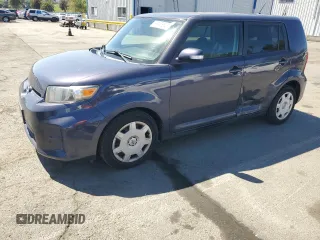 2011 Scion xB z VIN JTLZE4FE7B1140115, wystawiony jako Copart lot #57458545 z przebiegiem 170 451 mil mil oraz Szkoda całkowita • Salvage title. Historia ofert i sprzedaży dostępna na DreamBid. Obrazek 1.