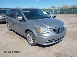 2016 Chrysler Town & Country Touring with VIN 2C4RC1BG7GR157863, listed as a IAAI auction lot 41849422 with 218,936 mi miles and . Bid and sale history available at DreamBid. Image 1.