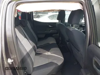 2020 Toyota Tacoma SR5 with VIN 3TMCZ5AN7LM321061, listed as a IAAI auction lot 41985533 with 32,111 mi miles and . Bid and sale history available at DreamBid. Image 8.