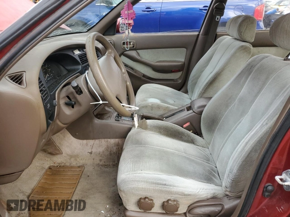 1993 Toyota Camry LE with VIN 4T1SK12E8PU240803, listed as a Copart auction lot 76663004 with 214,911 mi miles and Salvage Title. Bid and sale history available at carsss.com. Image 7.